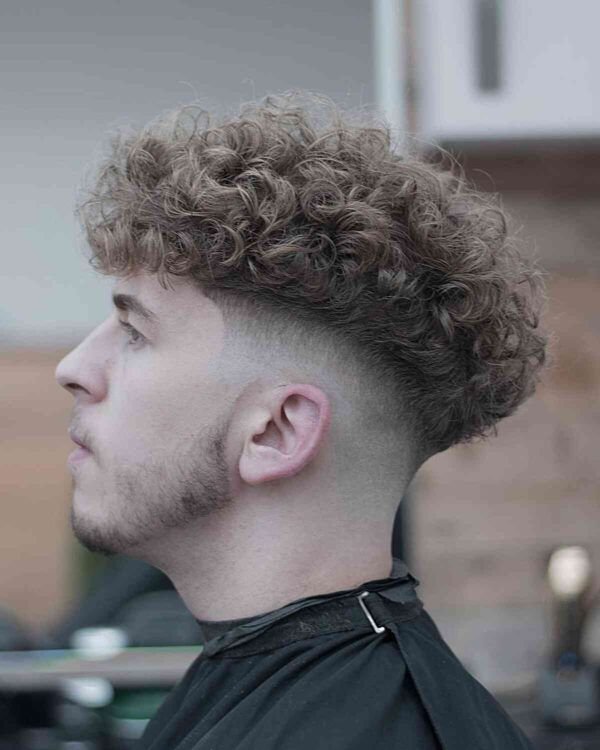 Loose, Flowing Parted Curls With Taper Fade