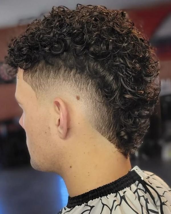 Messy Curly Mohawk with Taper Fade